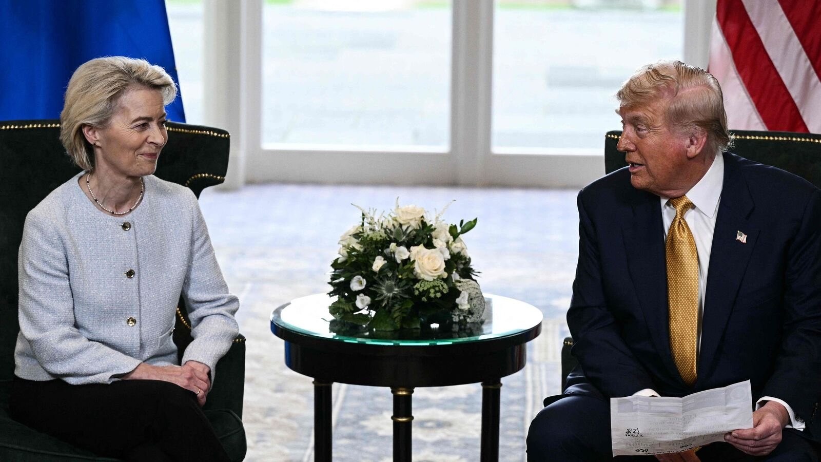US President Donald Trump (R) and European Commission President Ursula von der Leyen (L) speak to the press following their meeting, in Turnberry south west Scotland on July 27, 2025. (Photo by Brendan SMIALOWSKI / AFP)