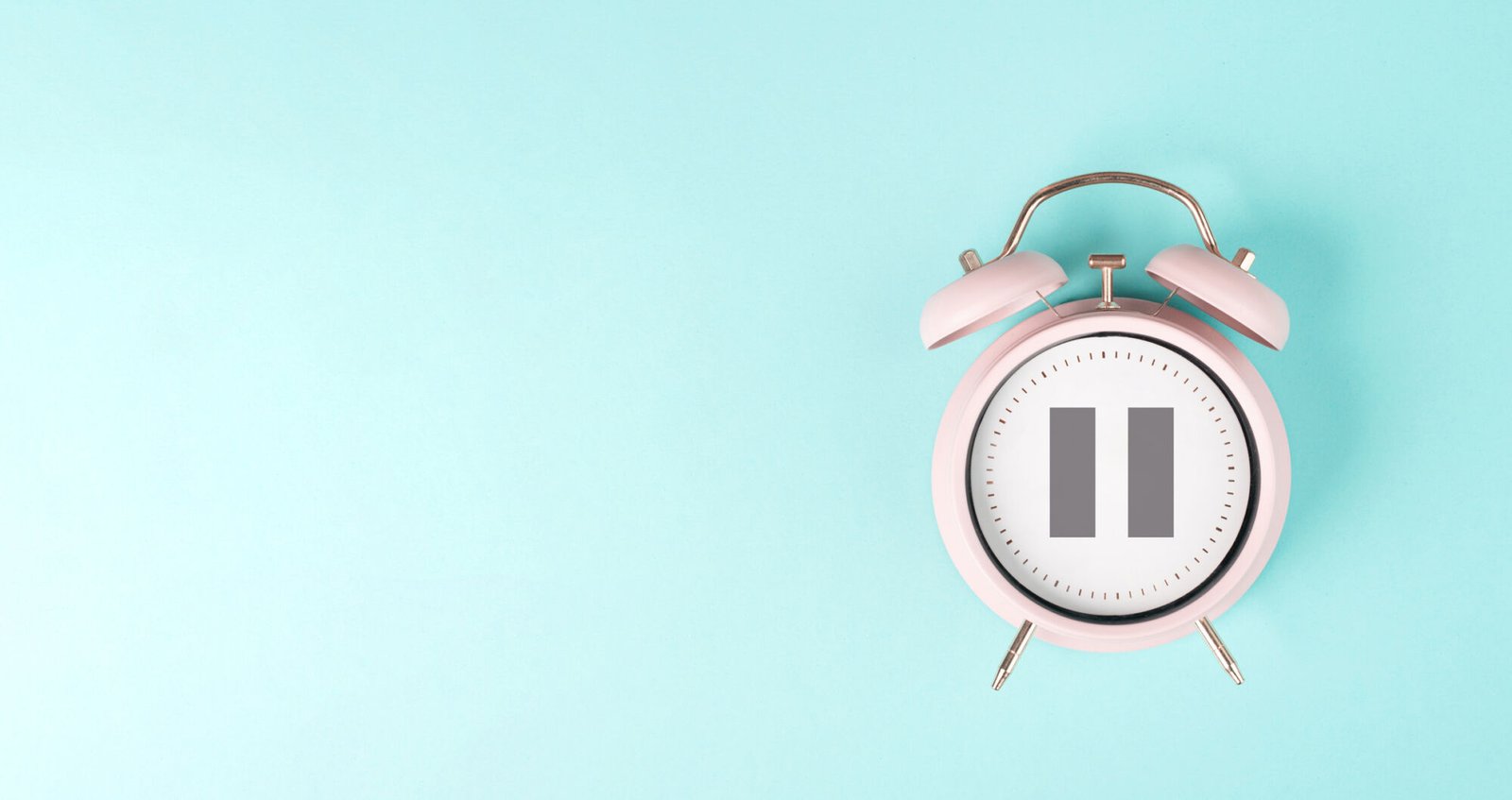 Alarm clock with pause sign, take a break, menopause concept, hormone replacement therapy