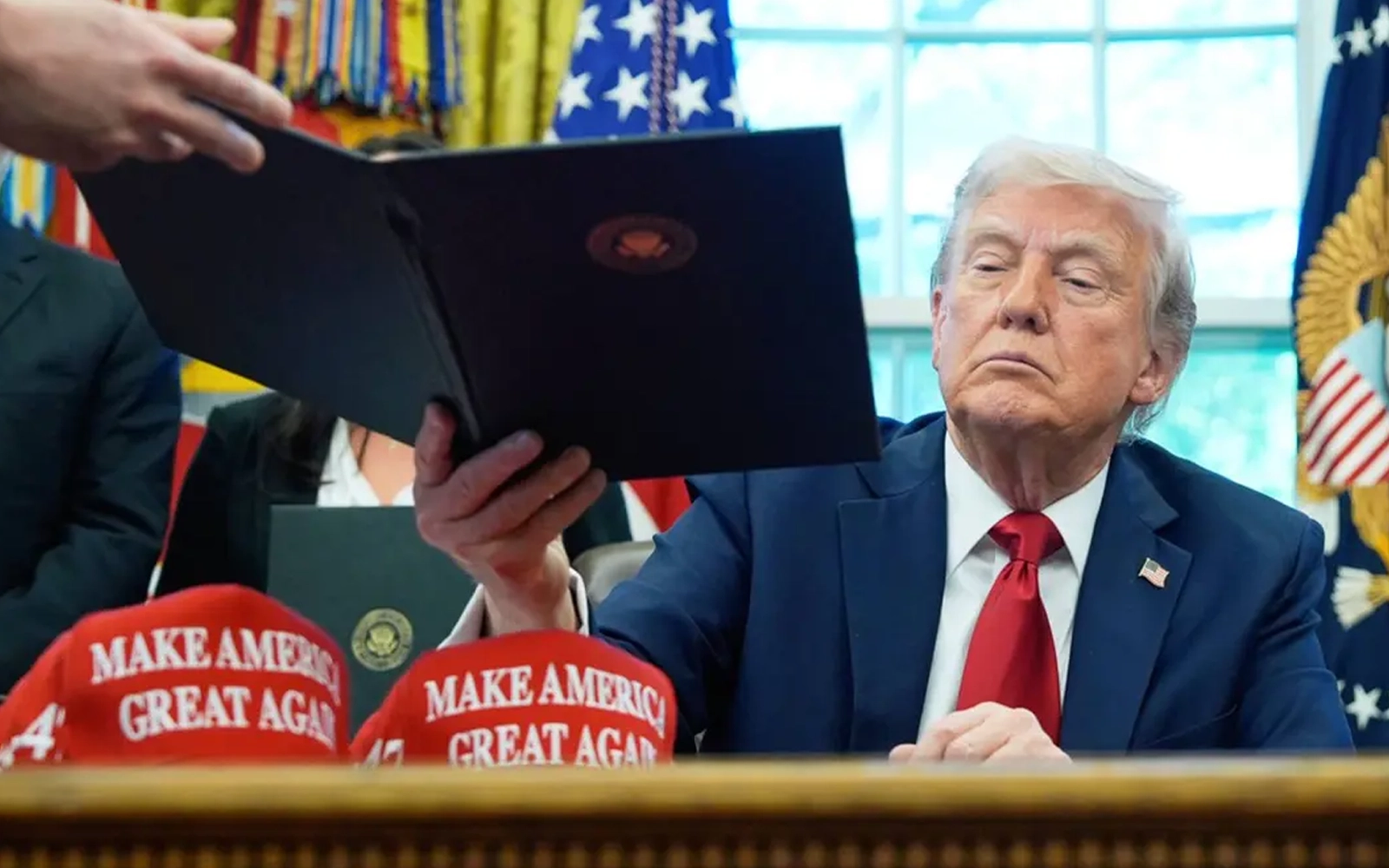 Cover Image for Clock ticks on US tariff hikes as Trump broadens blitz