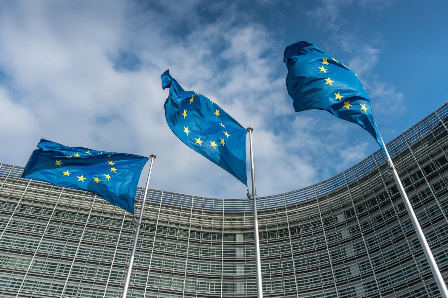 Some American companies have agreed to comply with new, voluntary AI standards from European Union regulators, in advance of new regulations set for 2027, but others have decried them as overreach.