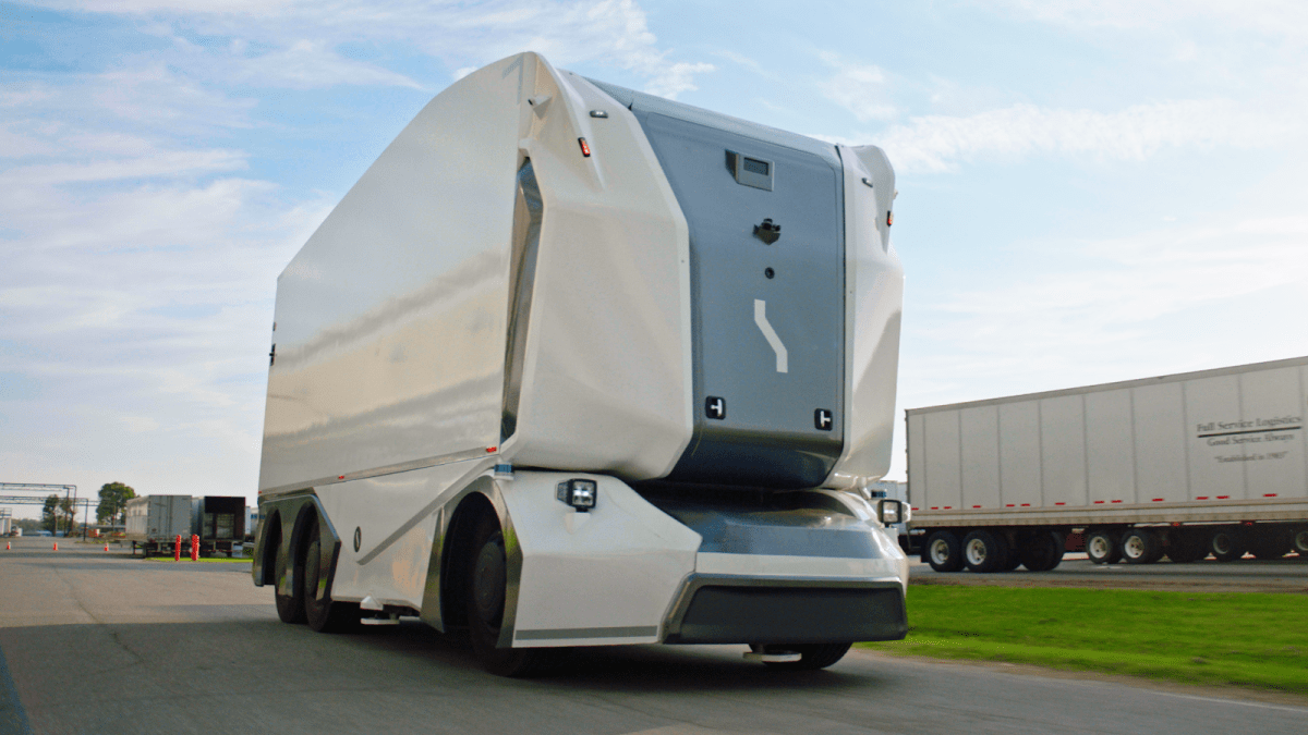 Einride's autonomous electric pod, a truck built without a cab for a driver, on road