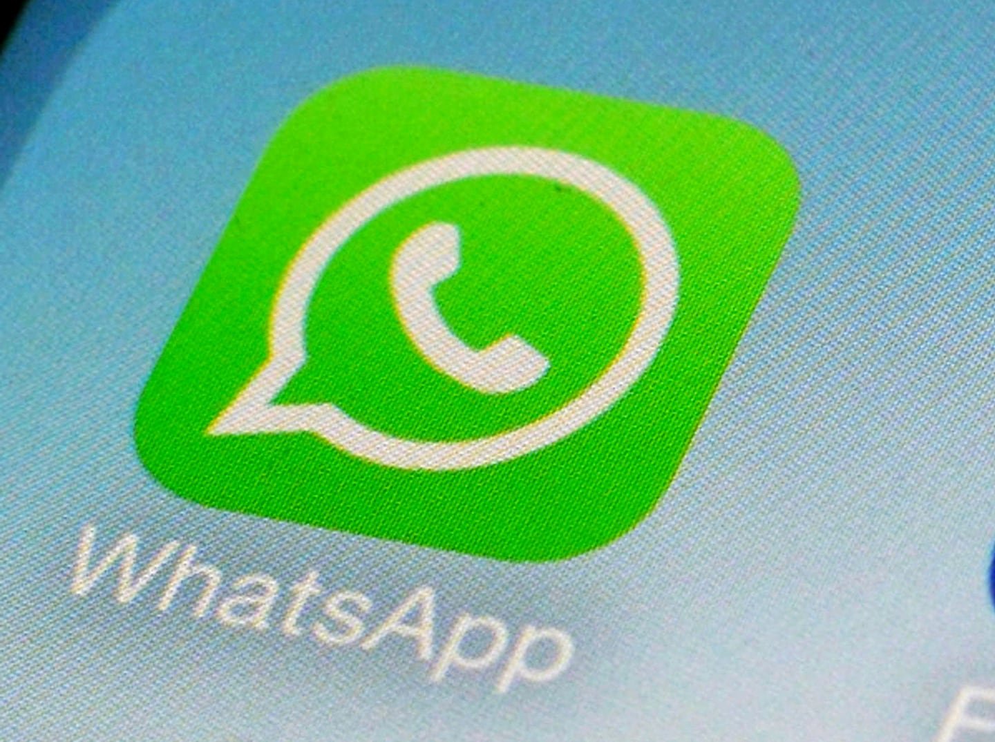 WhatsApp app icon on a smartphone in New York in 2014.
