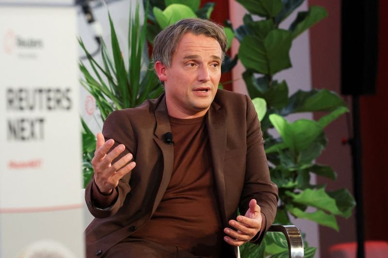 REUTERS NEXT - SAP CEO urges Europe to unite and ease AI rules to stay competitive