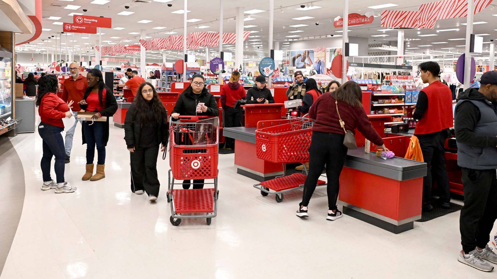 Target steps up investment in store staffing, cuts about 500 other roles
