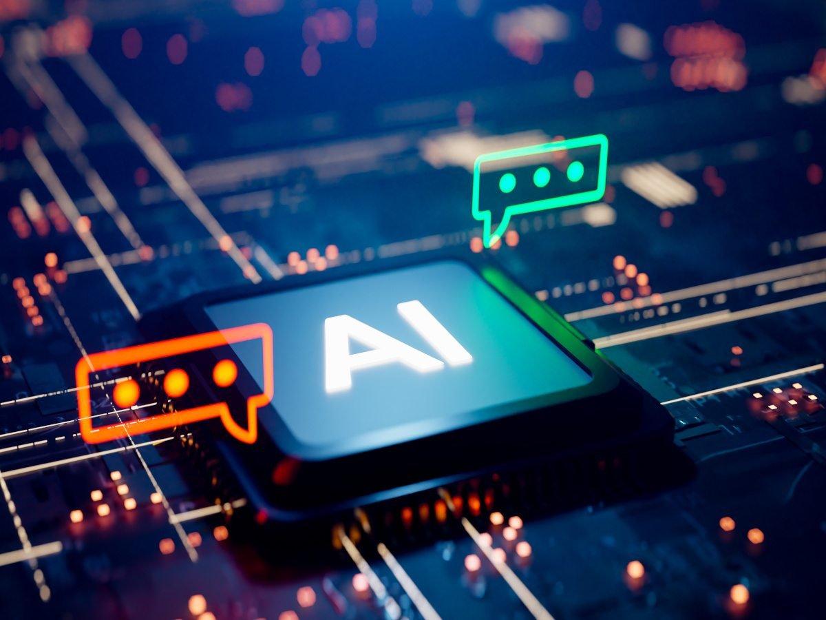 Rectangular speech bubbles next to an AI chip that has “AI” written on it.