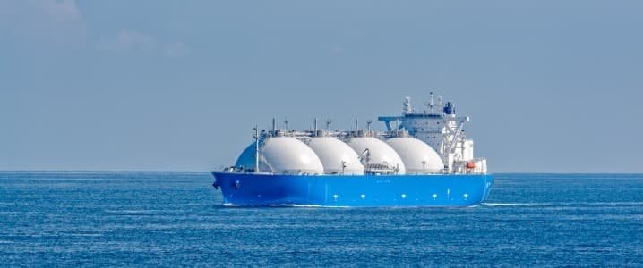image showing a blue LNG tanker on blue water