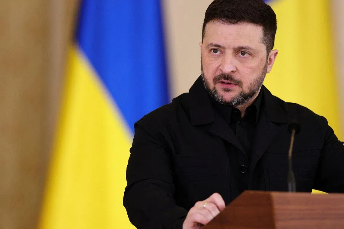 Ukrainian President Volodymyr Zelenskiy speaks during a press conference with Romanian President Nicusor Dan (not pictured), in Bucharest, Romania, March 12, 2026. Inquam Photos/Octav Ganea via REUTERS