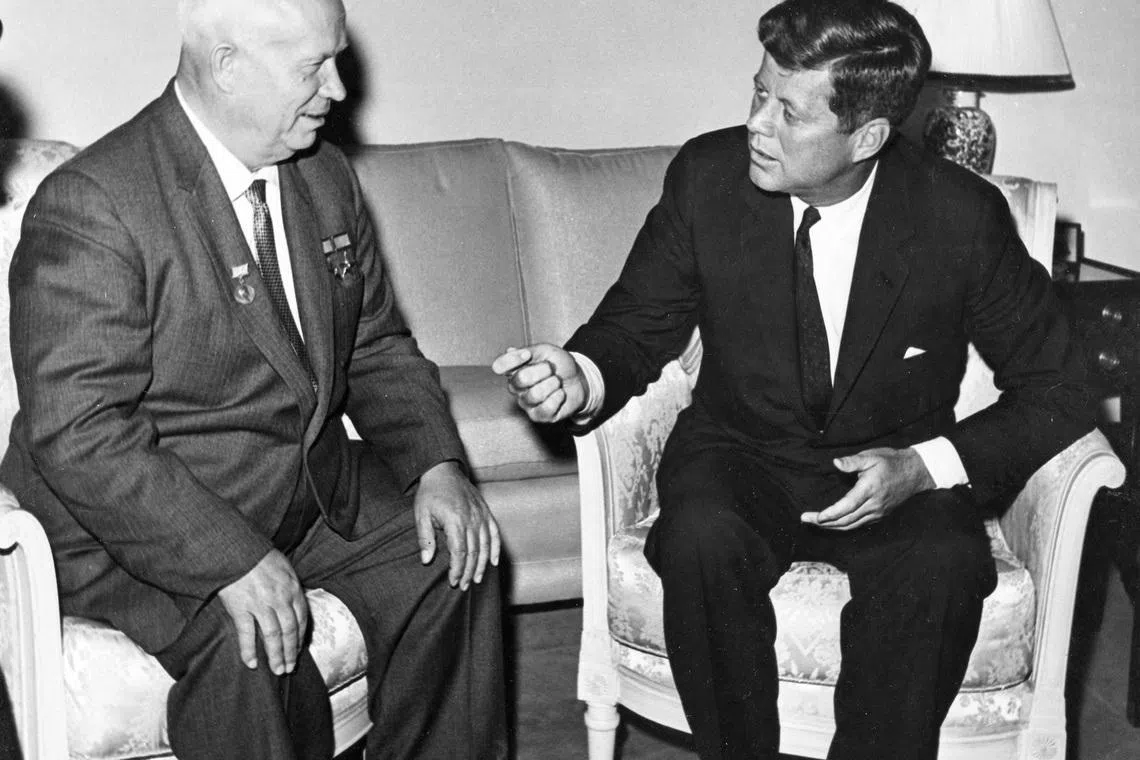 FILE PHOTO: Former United States President John F. Kennedy (R) meets with Nikita Khrushchev, former chairman of the council of Ministers of the Soviet Union, at the U.S. Embassy residence in Vienna, Austria in this June 1961 handout image.   REUTERS/Evelyn Lincoln/The White House/John F. Kennedy Presidential Library/File Photo