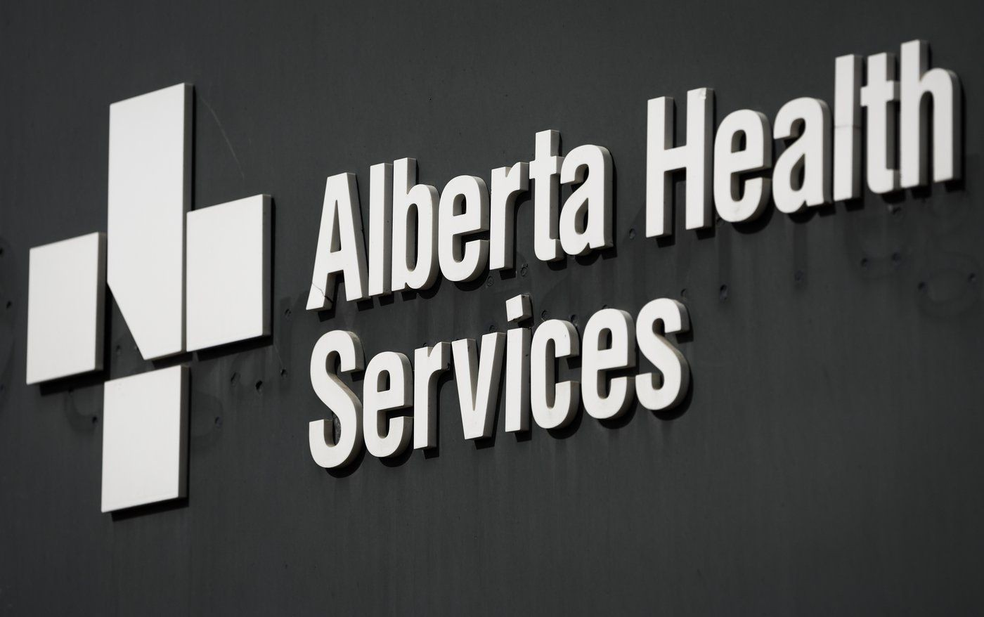Alberta Health Services lays off 100 employees
