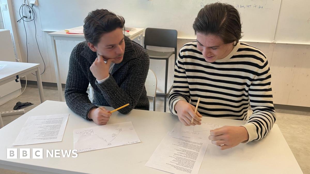 Sixteen-year-old pupils at a high school in Nacka, Sweden, using pencils and paper