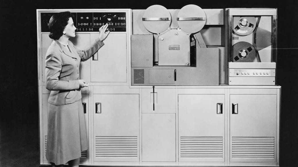 woman with 1950s computer