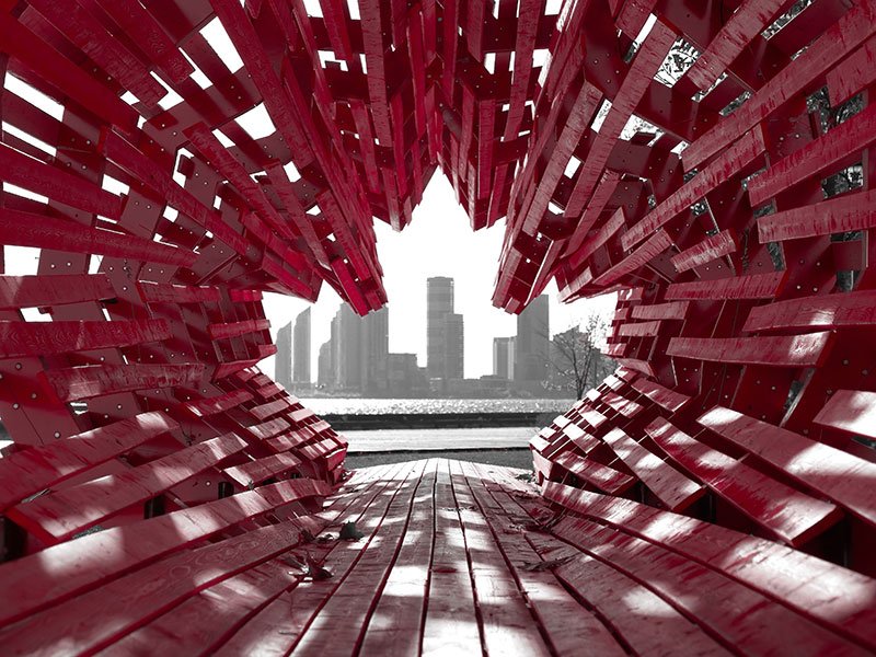 View of Canadian city through a structure shaped like a maple leaf