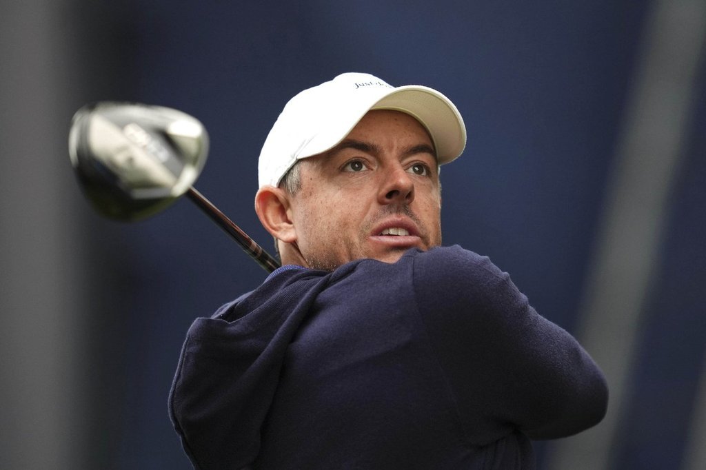 Rory McIlroy of Northern Ireland tees off the 17th during day four of the 2025 BMW PGA Championship at Wentworth Golf Club in Virginia Water, Surrey, England, Sunday Sept. 14, 2025. (Adam Davy/PA via AP)