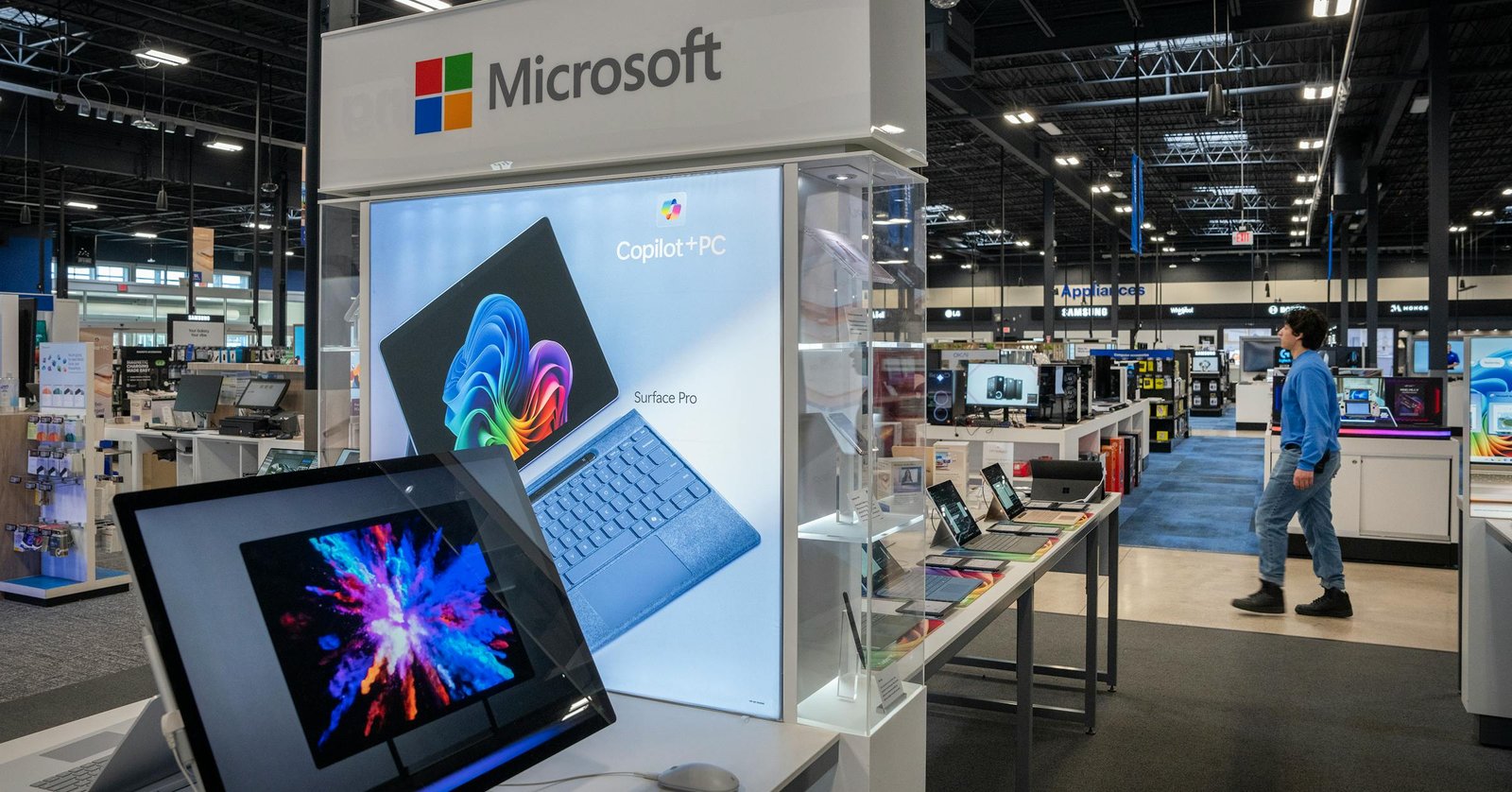 Best Buy announces layoffs, better-than-expected sales bump