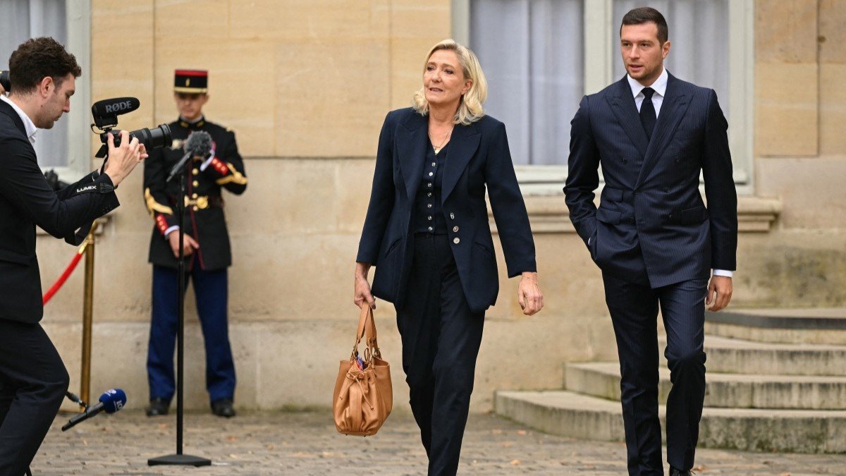 Rassemblement National (RN) President Jordan Bardella (R) and President of Rassemblement National’s parliamentary group Marine Le Pen leave after a meeting with France’s prime minister at the Hotel de Matignon in Paris, on September 2, 2025.