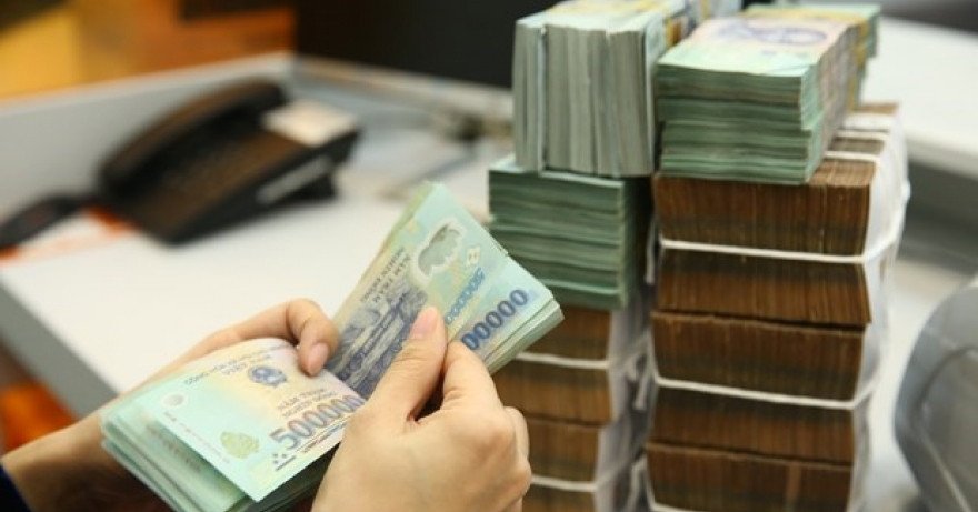 Vietnam raises foreign ownership cap for banks to 49% to attract investment