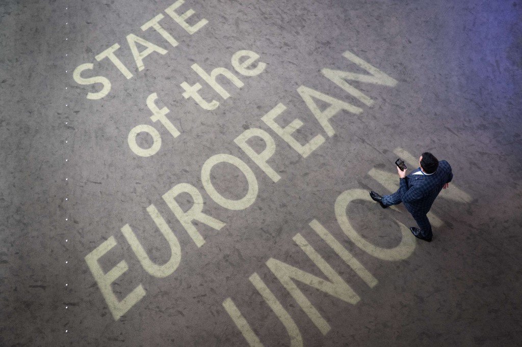 A man passes on a light sign that reads “state of the European Union“ on Sept. 10, 2025, the same day of the EU Commission President's annual State of the Union address, during a plenary session at the European Parliament in Strasbourg, eastern France.