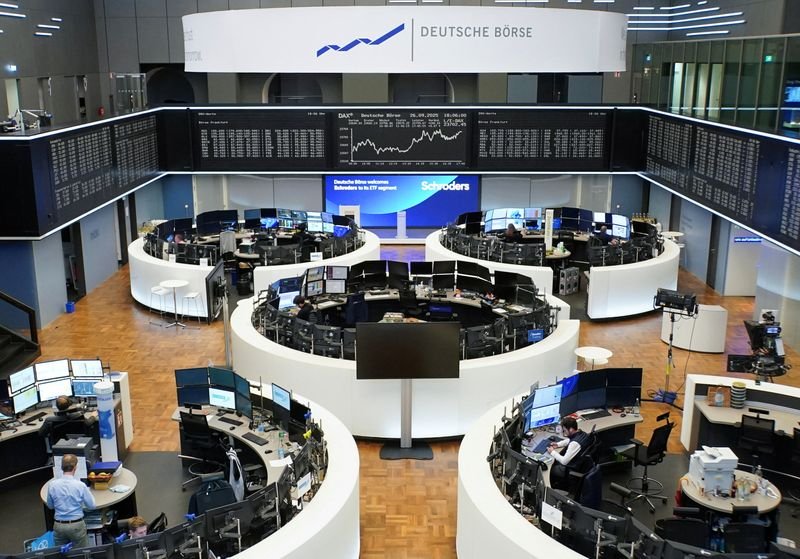 US, European stocks hit record highs as investors shrug off US shutdown impact