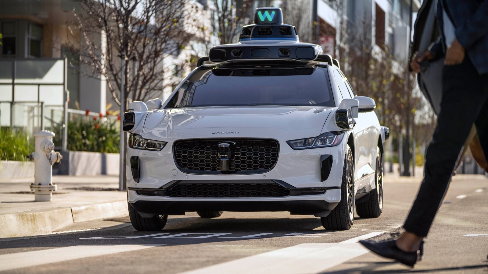 Chinese autonomous vehicle companies, including Baidu’s Apollo Go, WeRide, and Pony AI, are expanding robotaxi services overseas, challenging US leaders like Waymo, Tesla, and Zoox.