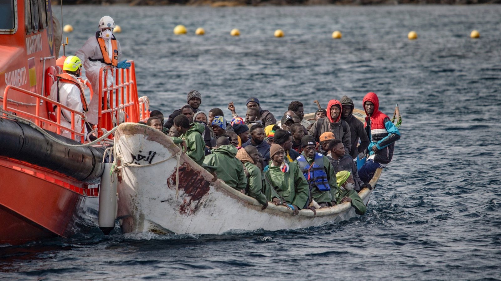 A 'cayuco' boat from Mauritania with 78 migrants onboard arrives after being rescued at sea by the Spanish Salvamento Maritimo’s Salvamar Acrux vessel, at La Restinga port on the Canary island of El Hierro, on November 23, 2024.