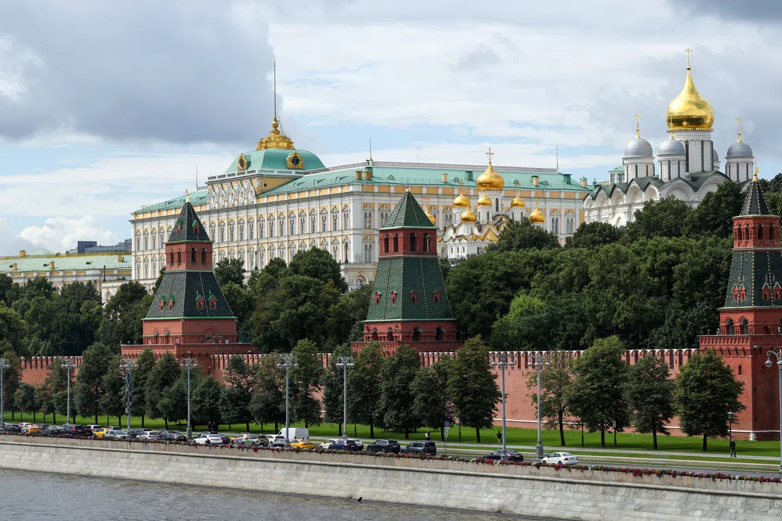 A view shows the Kremlin's towers, the Grand Kremlin Palace and cathedrals behind the wall in central Moscow, Russia, August 7, 2025. REUTERS/Evgenia Novozhenina