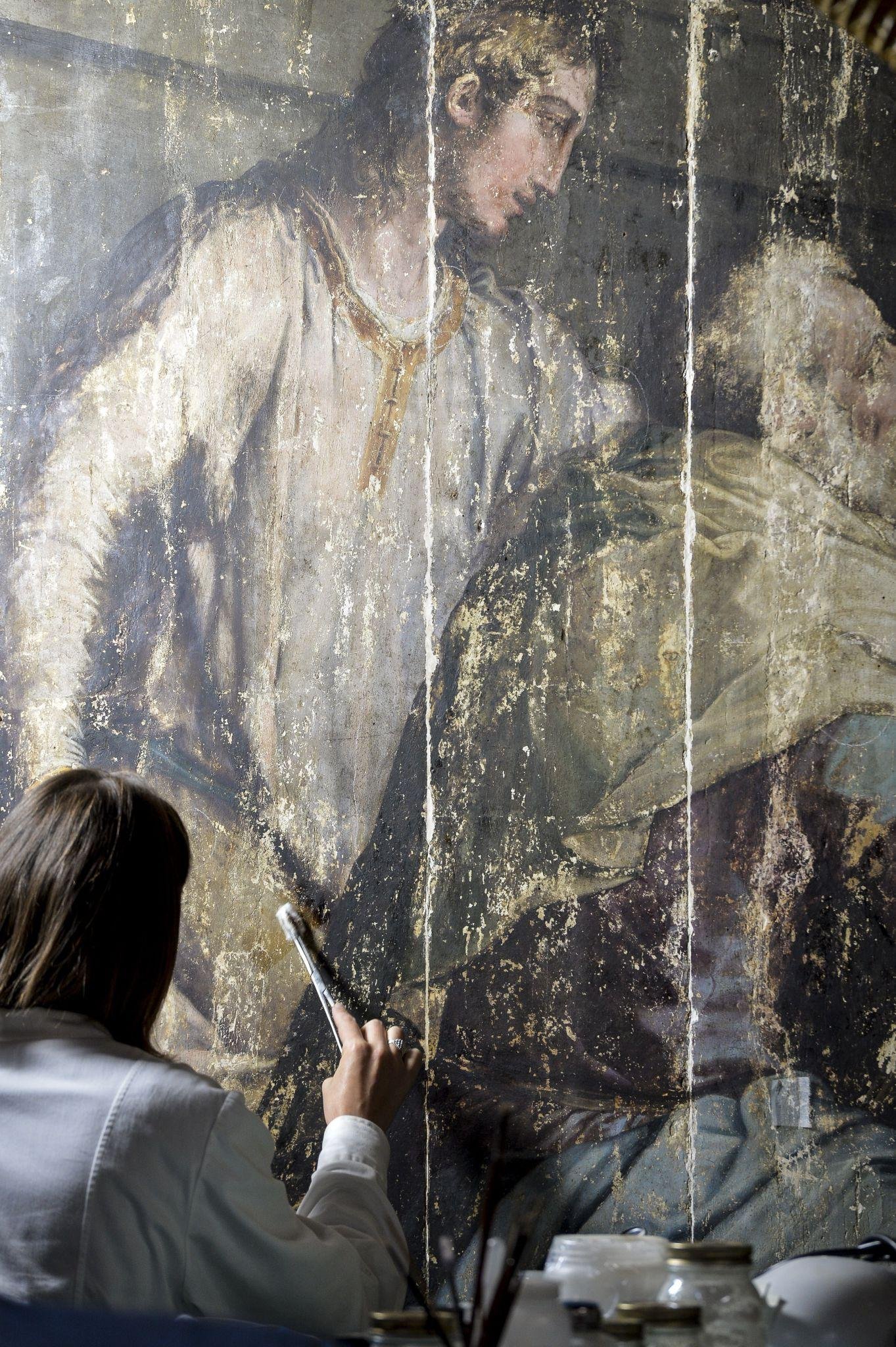 Italy art restoration focuses on preserving church wall painting