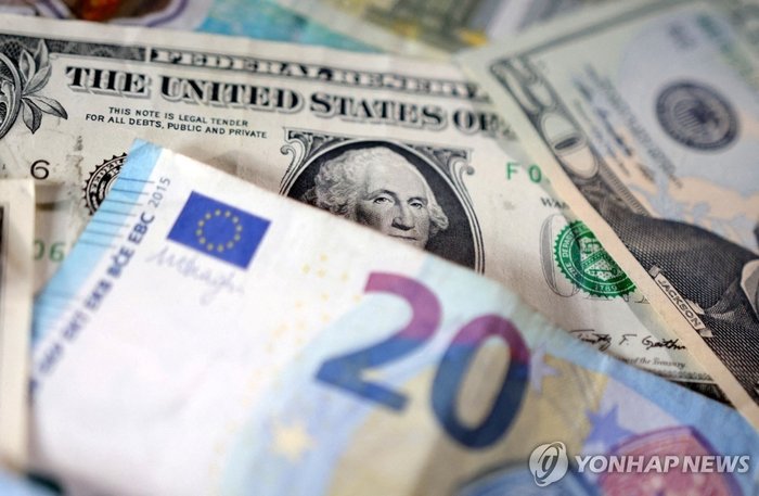 the euro and the dollar. Reuters Yonhap News