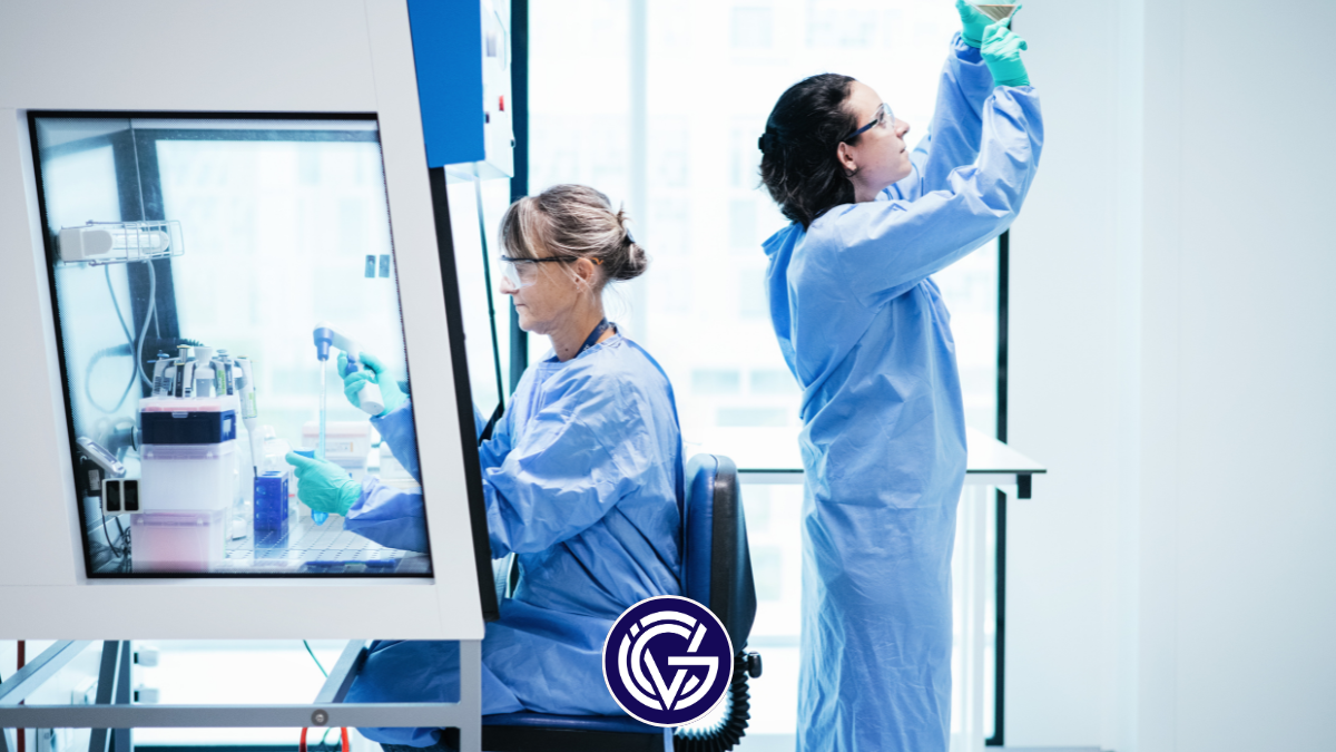 Two scientists work in a pharmaceutical lab, with the GCV logo interspersed on top