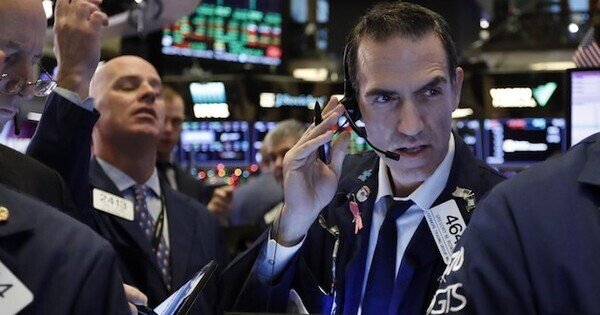 Dow Jones ekes out gain while Nasdaq sheds more than 1%