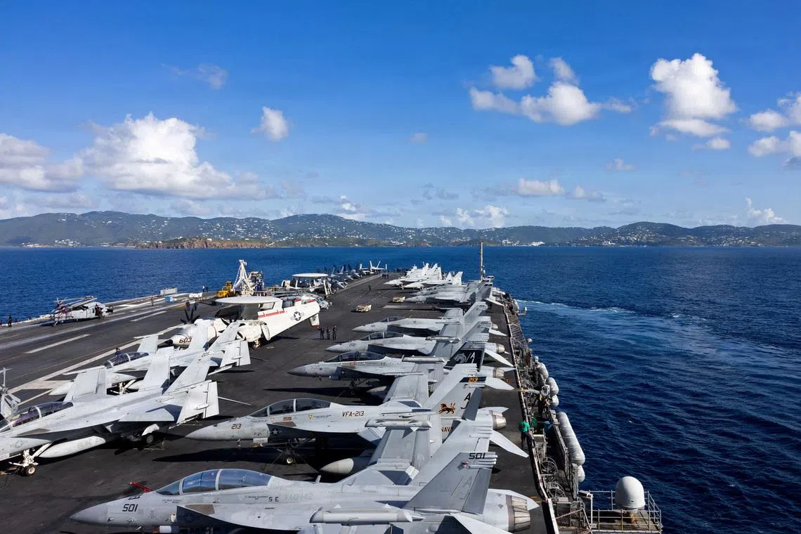 US carrier Ford, deployed in war with Iran, to go to port temporarily after fire