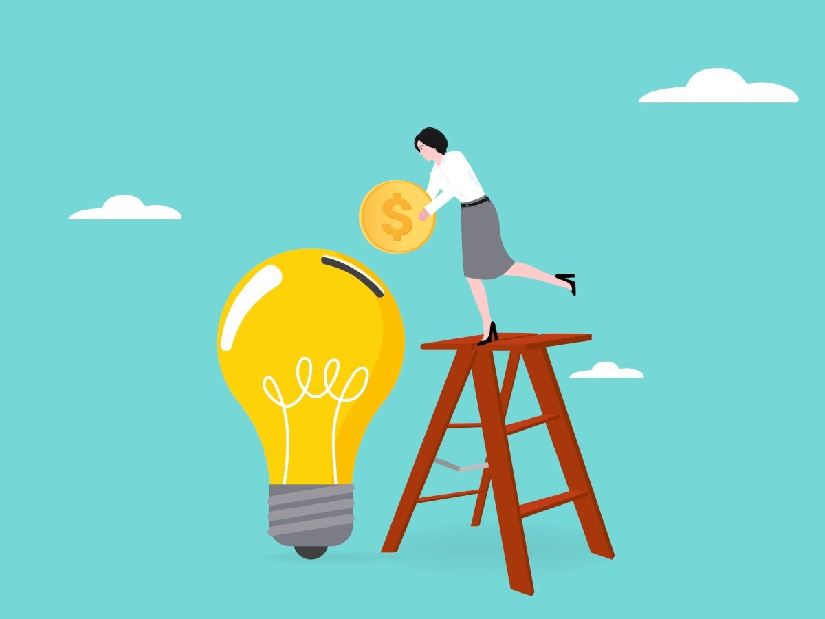 A cartoon woman on a ladder putting a coin into a giant bulb, indicating fundraising for a new start-up.