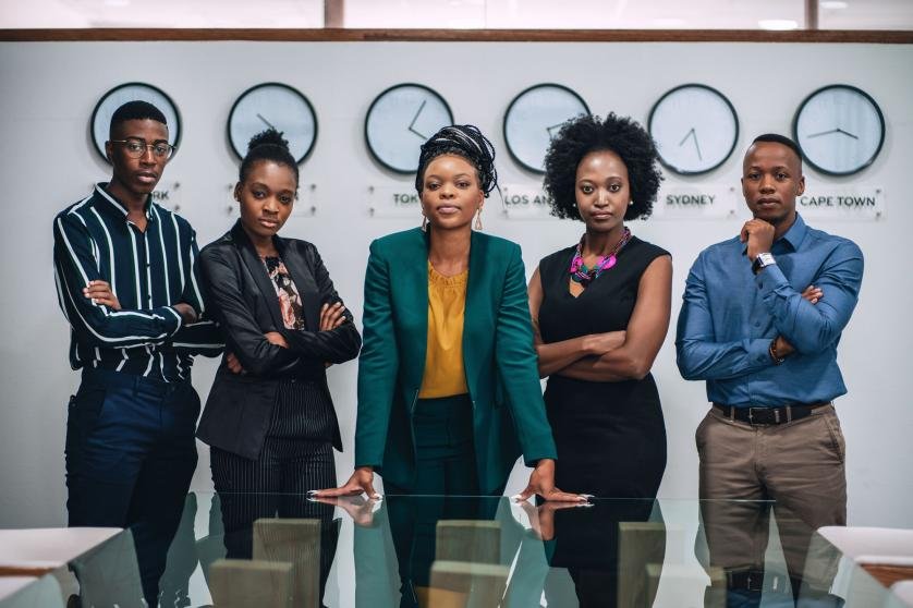 Portrait of young business team standing in the office