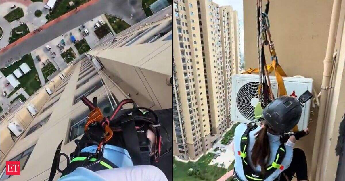 As Europe faces extreme heat, China's 'Spider-Woman' AC installer stuns the internet