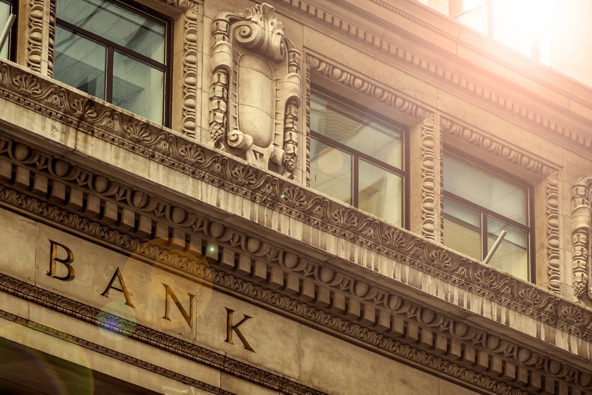 A closeup shot of the front of a downtown bank building.