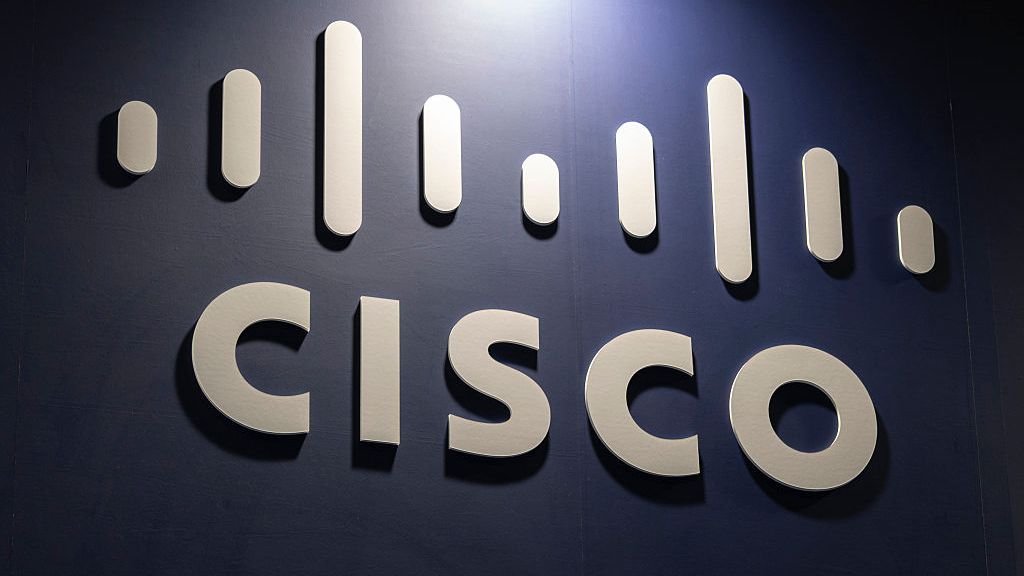 The Cisco logo on a blue wall.